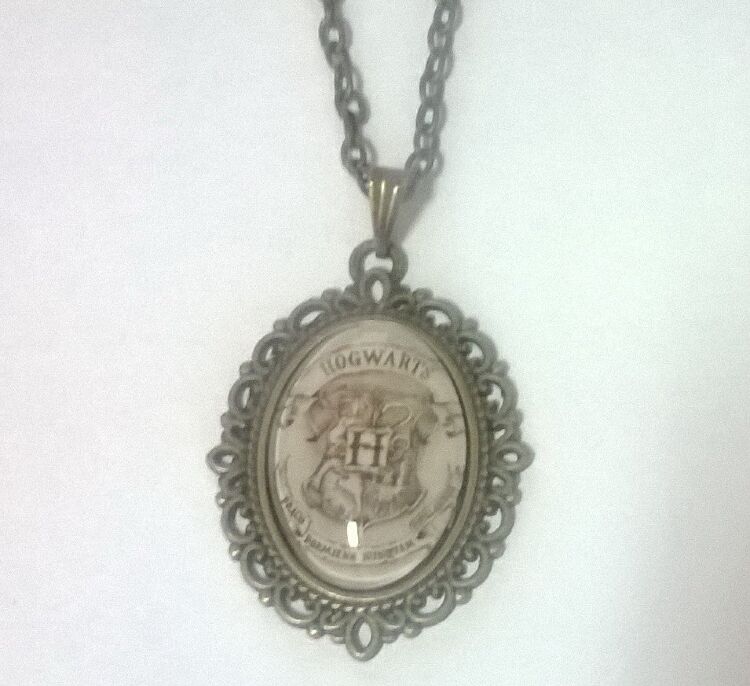 Медальон Harry Potter Hogwarts 4х3 см.