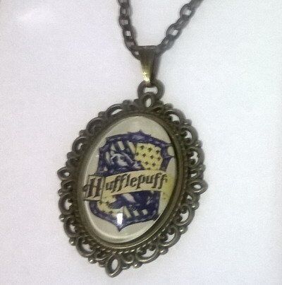 Брелок Harry Potter Hufflepuff 4х3 см. Брелок Harry Potter Hufflepuff 4х3 см.